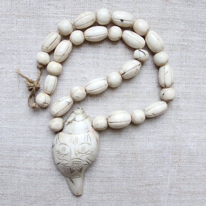 Conch shell necklace by Kronbali